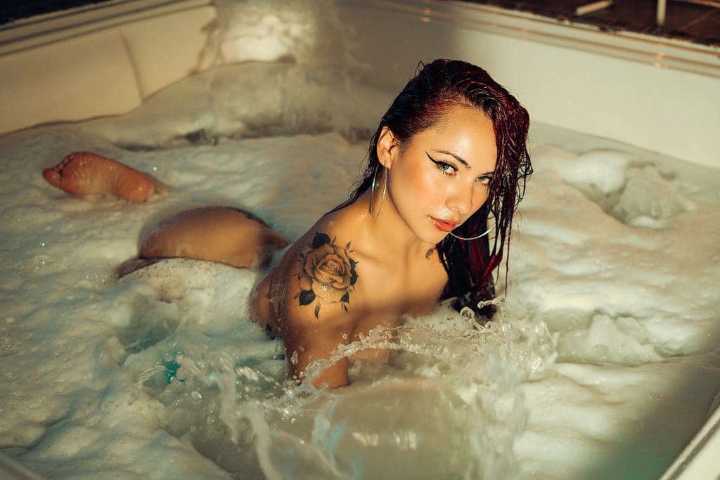 ValeryHarllow baths full nude showing off her ass surrounded by foam