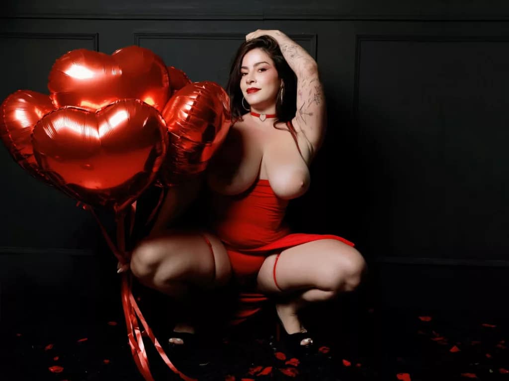 ChristineBray in red dress, heart balloons, huge tits, birthday sex ideas with playful charm.